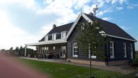 Achterzijde woning met aanbouw